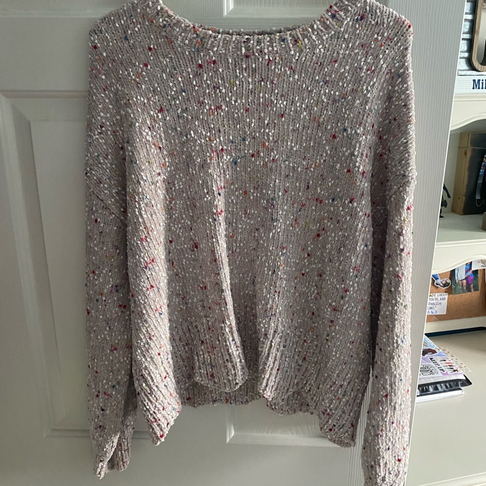 Neutral sweater with colorful balls all over the sweater!